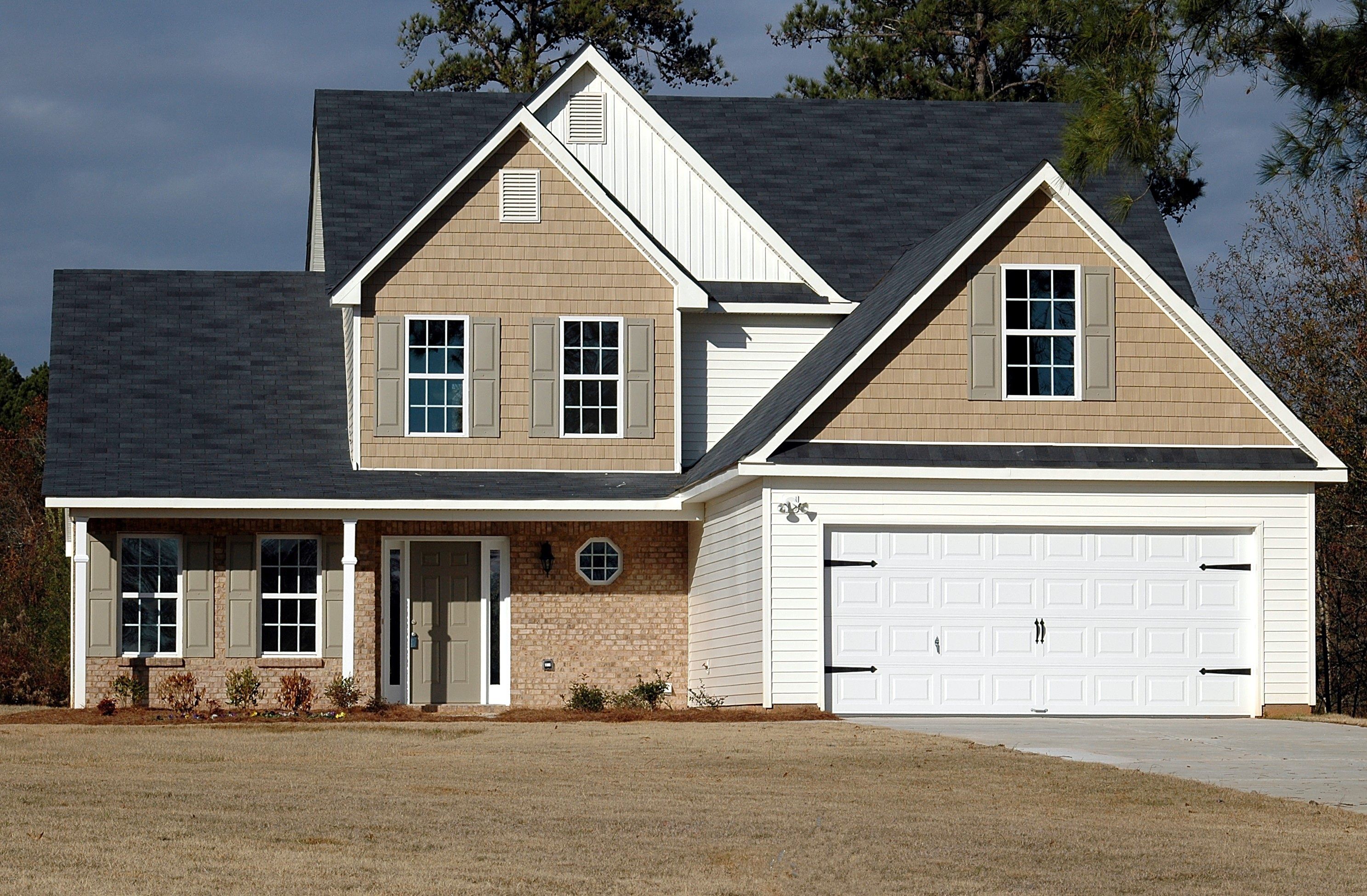 A residential home with an asphalt-shingle roof